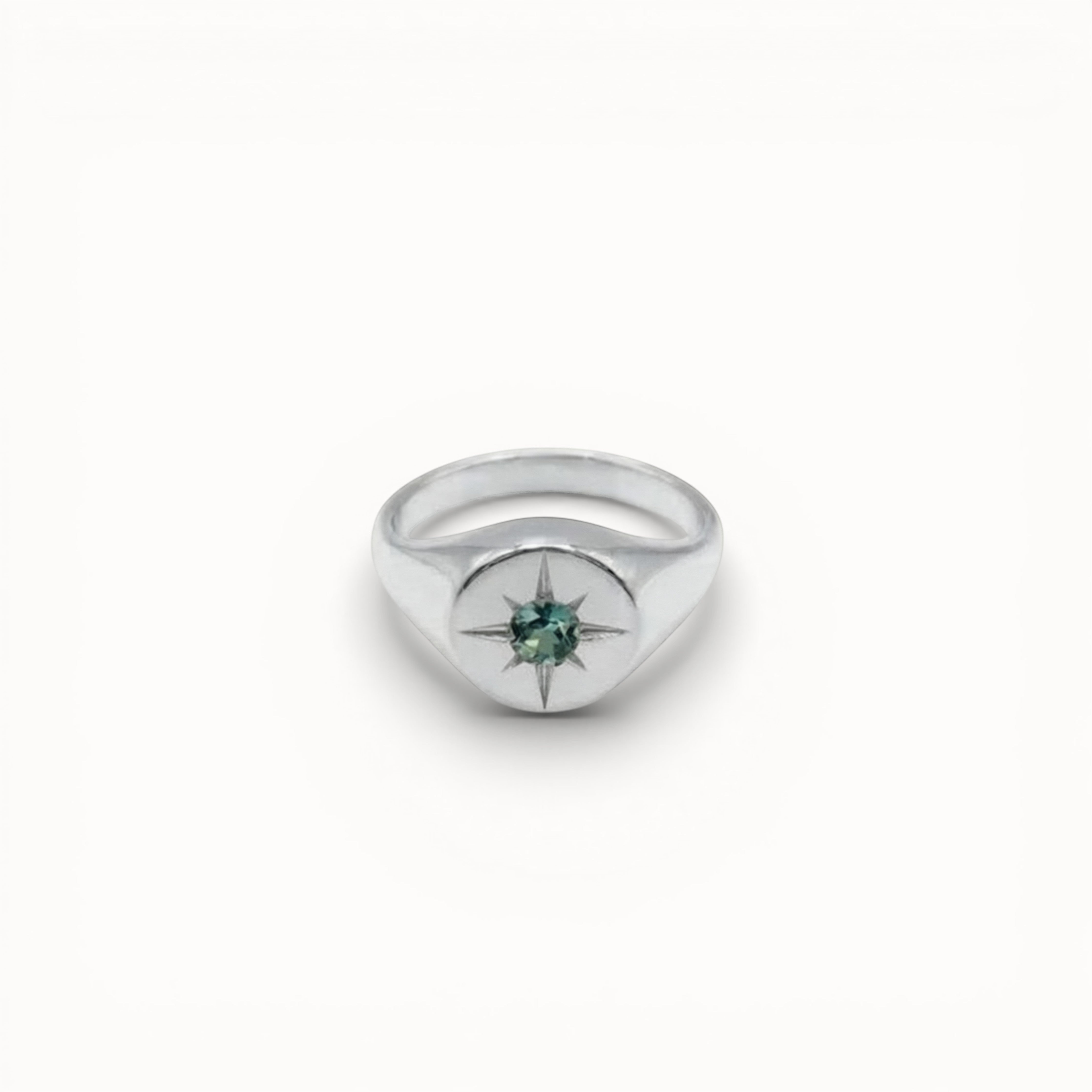 Loen Jewelry silver signet ring with a green starburst gemstone, inspired by New Wave.