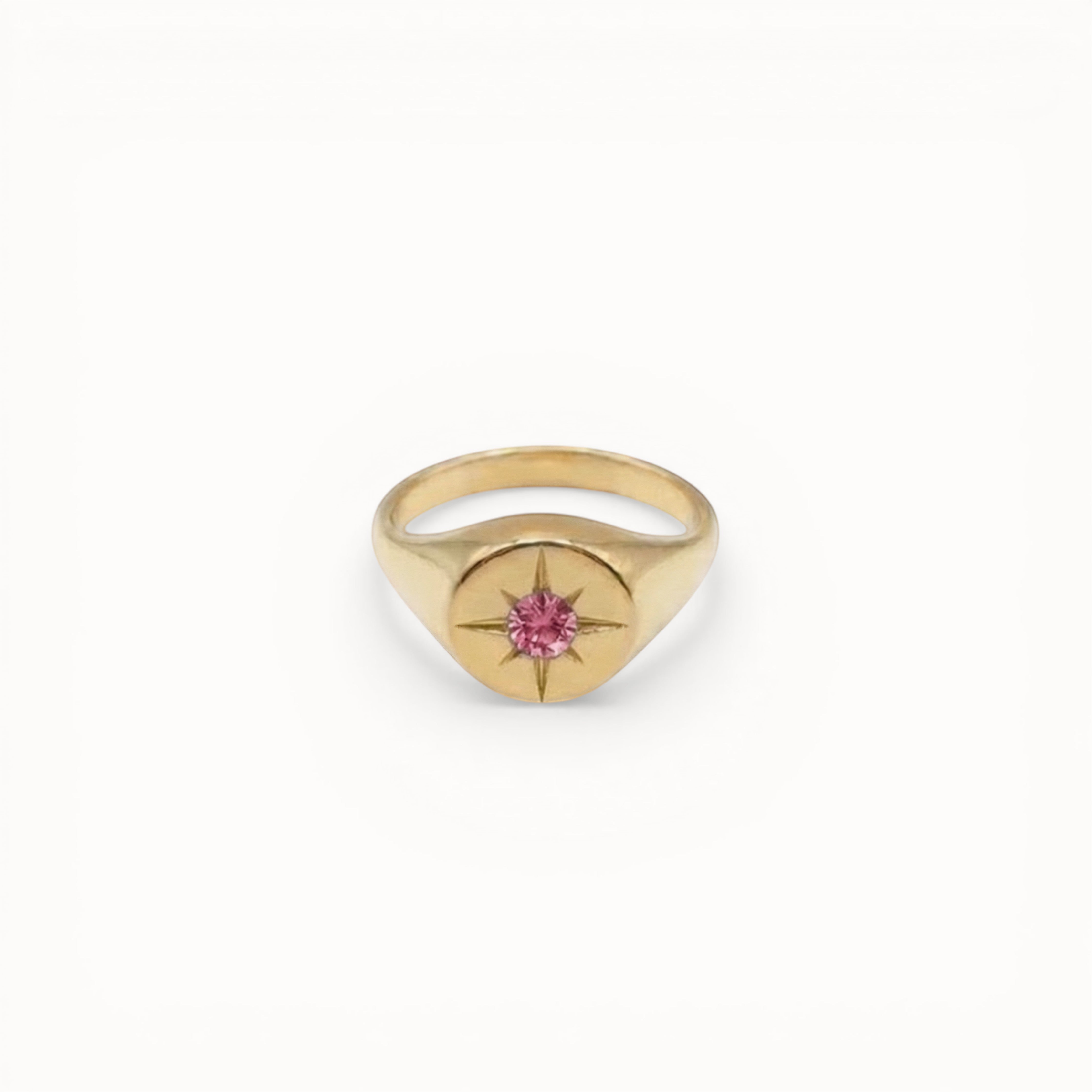 Loen Jewelry gold signet ring with pink starburst gemstone. Inspired by Parisian New Wave.