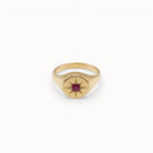 Loen Jewelry gold signet ring with red starburst gemstone, inspired by Parisian New Wave.