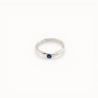 Loen Jewelry silver ring with blue sapphire accent, inspired by Parisian charm. Sterling silver, handmade.