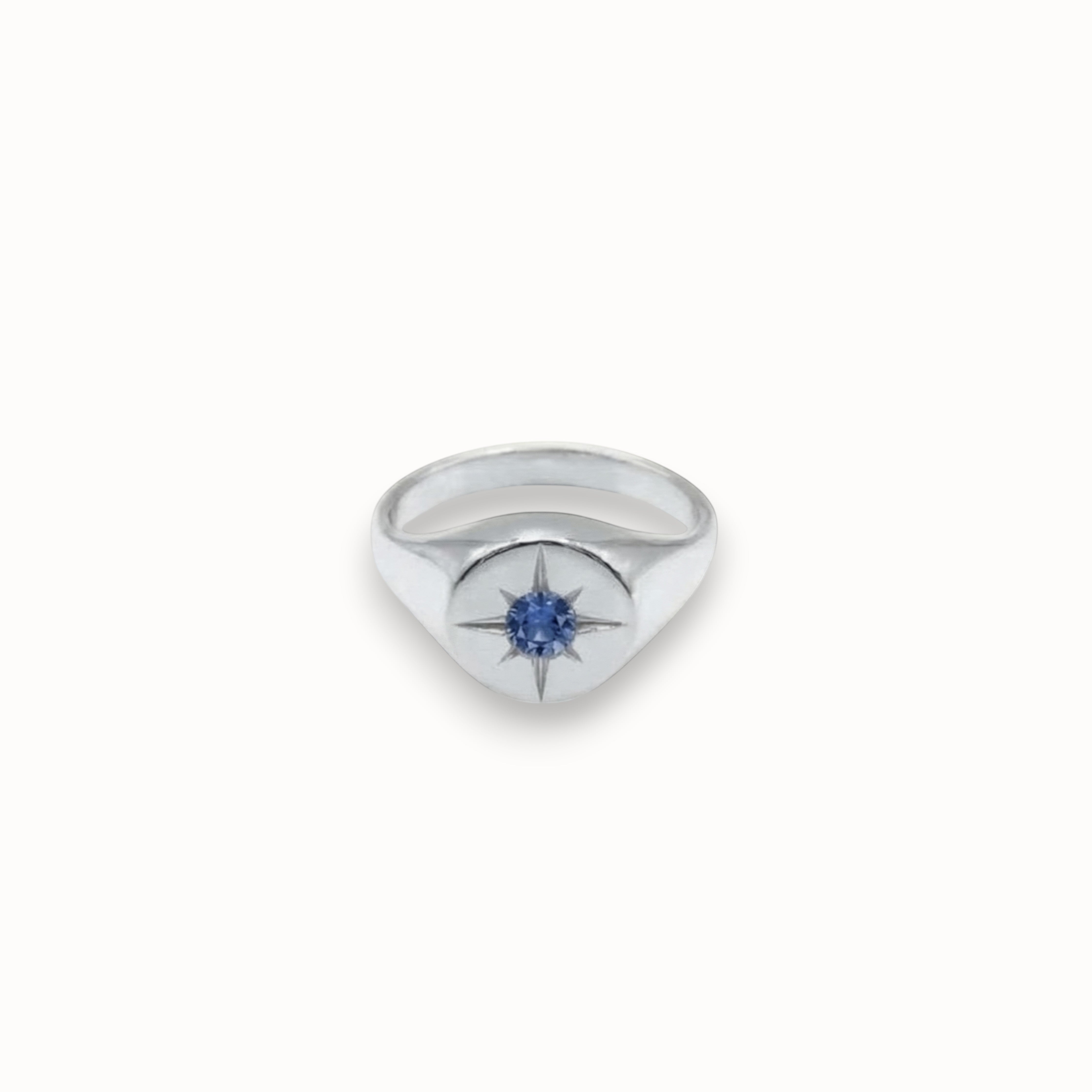 Loen Jewelry silver signet ring with blue starburst gemstone, inspired by New Wave cinema.